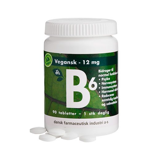 Vit burk med vegansk vitamin B6 12 mg, grön etikett och vita tabletter